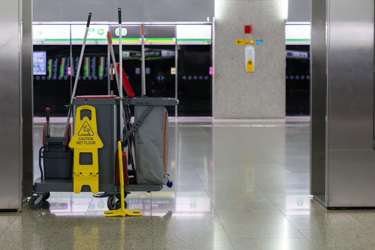 A gleaming, freshly polished floor in a bright commercial space